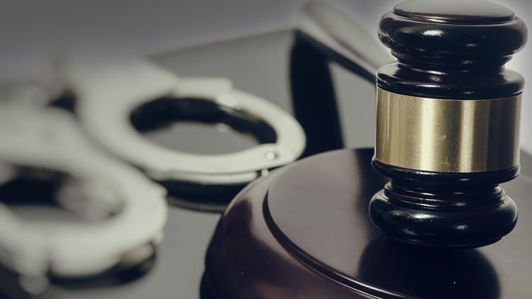 Gold scam suspect caught fleeing country