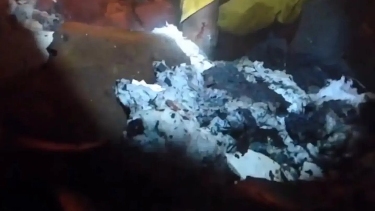Moment hero neighbour digs through wreckage to save boy, 4 ...