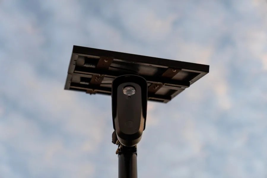 Why did 2 teens destroy a camera on her property?