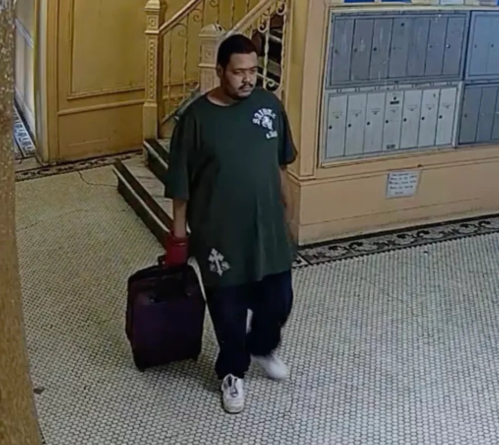 Son arrested after stranger spots him in murder case