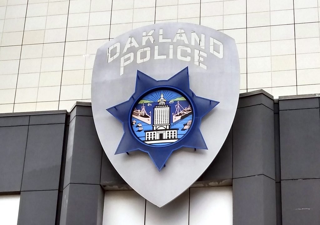 Man charged in two Oakland shootings, house fire