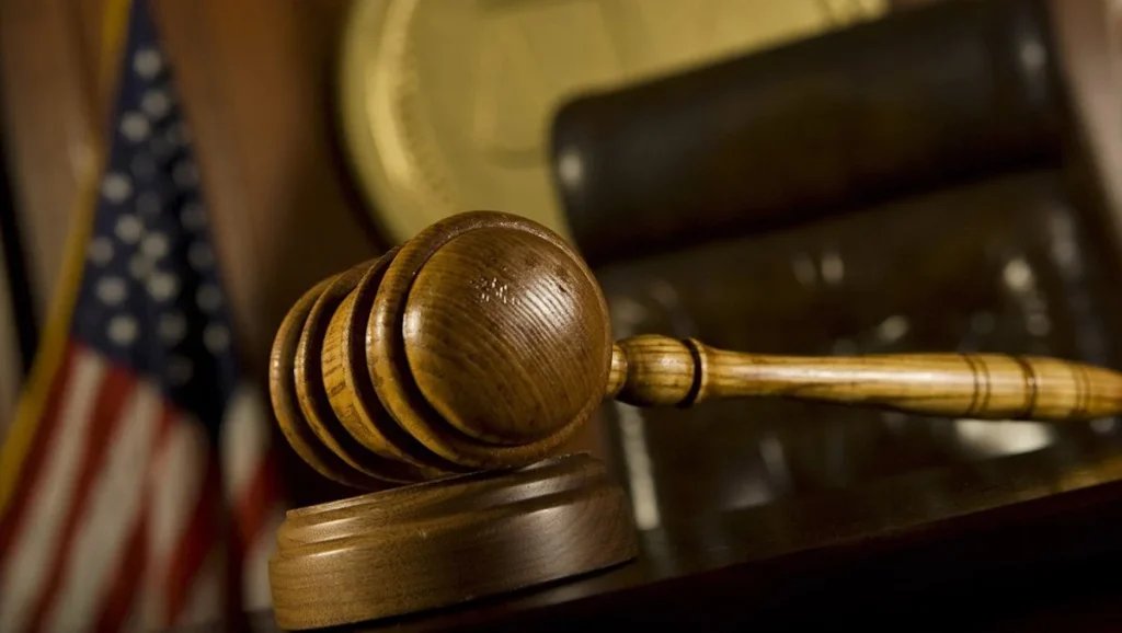 Woman accused of cleaning up after murder
