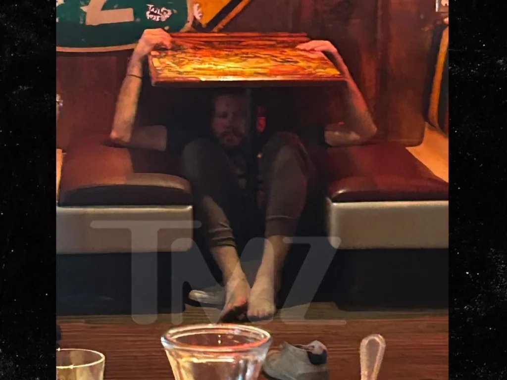 Ex spits at cops in wild bar arrest video