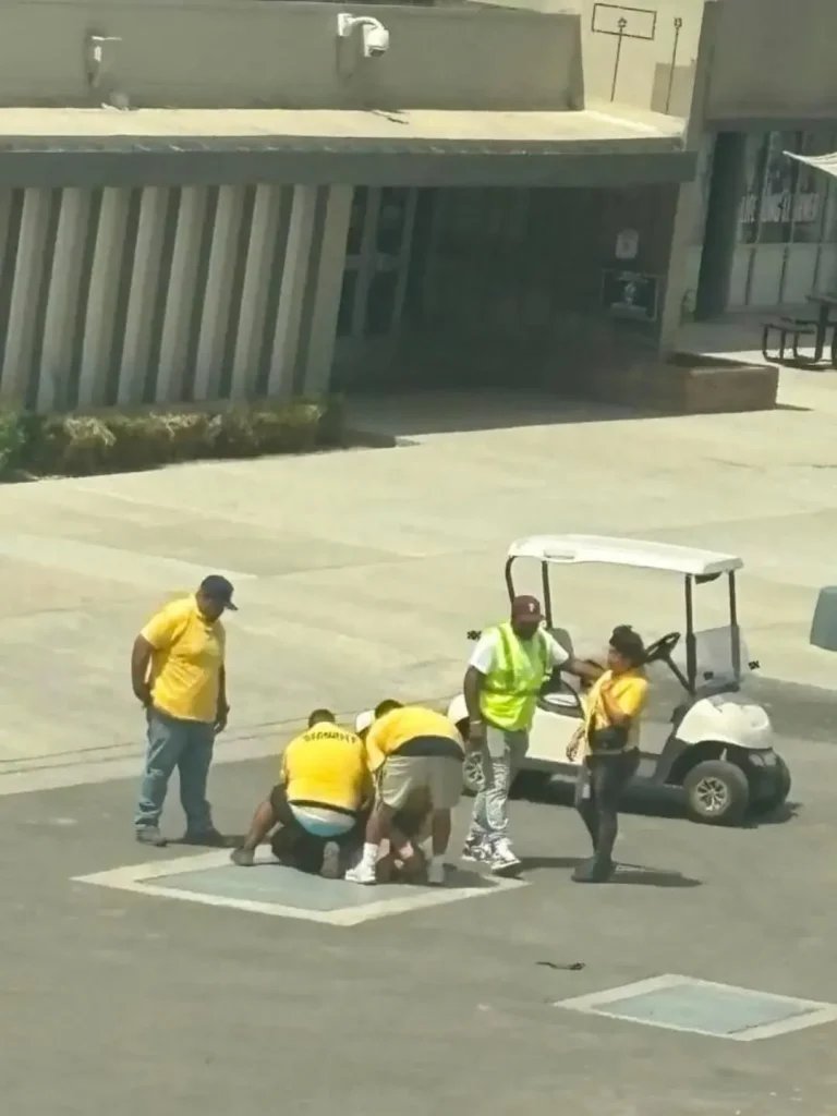 Security pinned teen on hot metal plate—why?