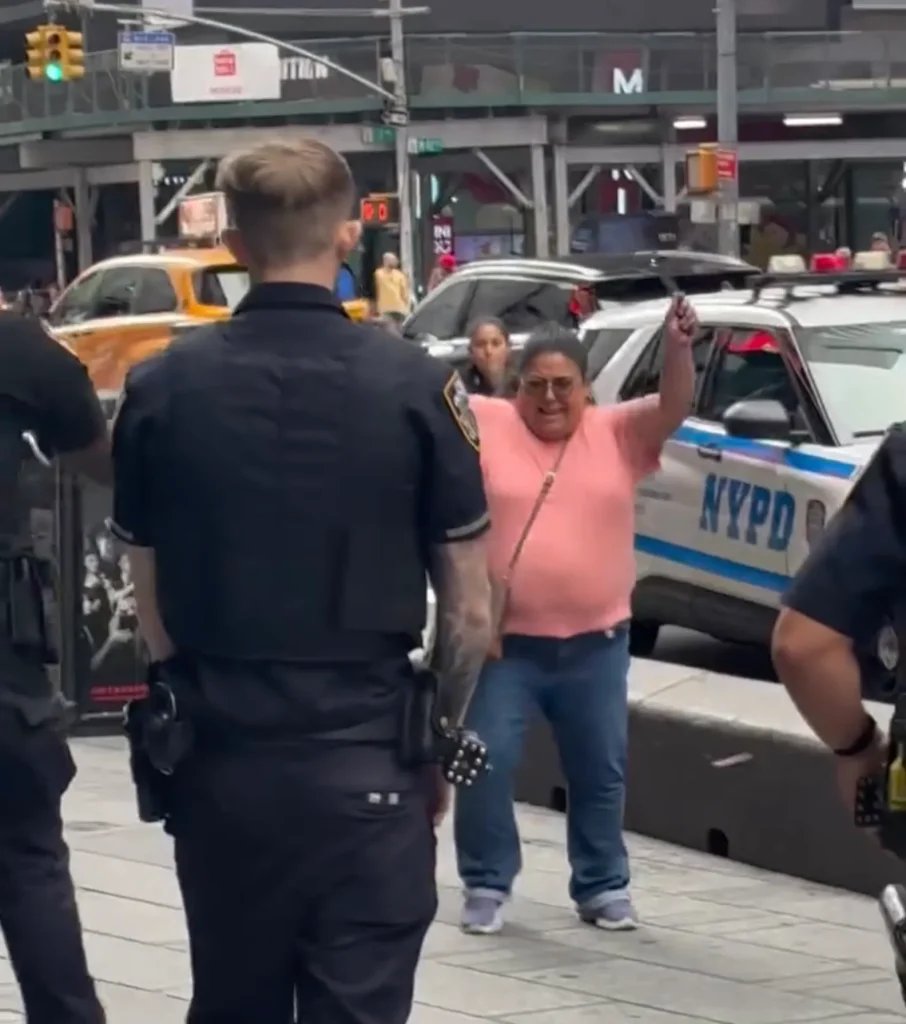 Woman stabs 2 in Times Square, charges at cops with knives