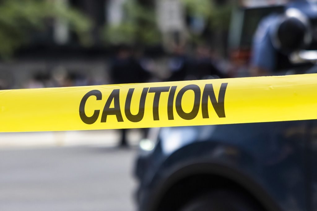 Woman killed in crossfire outside Lockport home