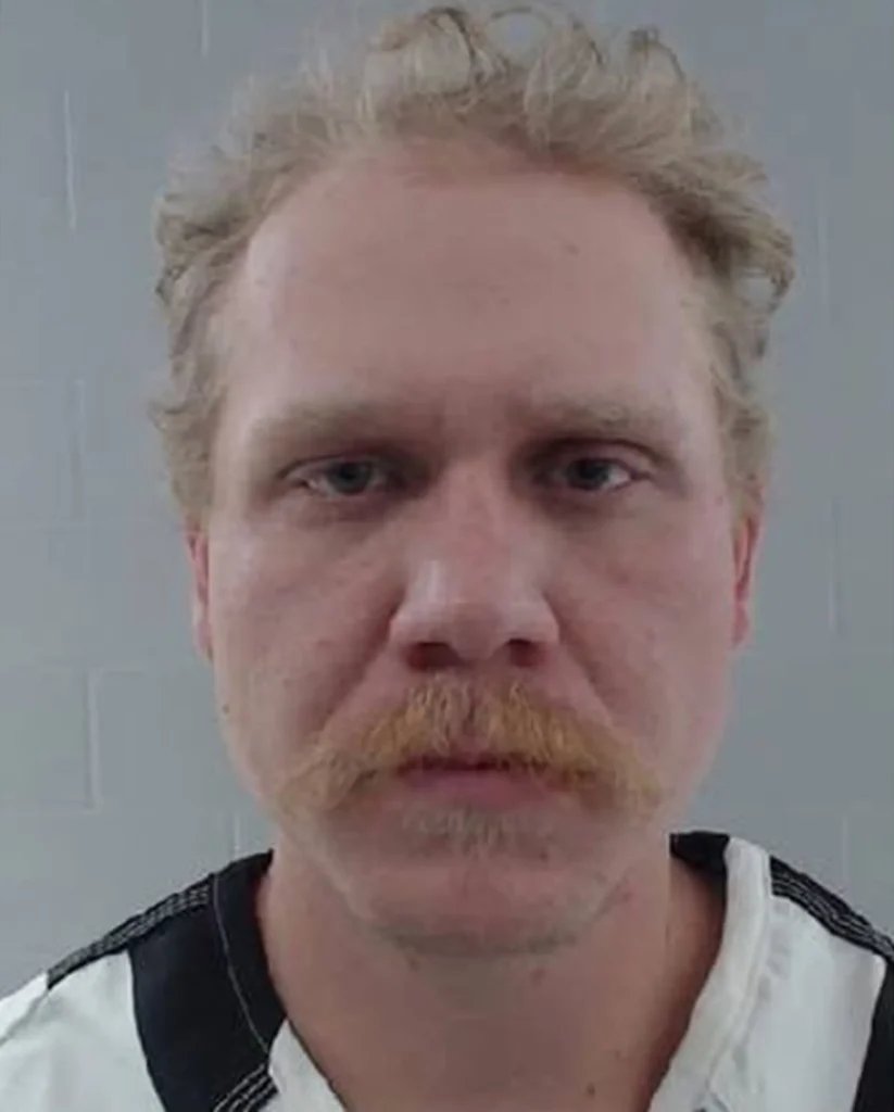 Ex-cop gets 3 life sentences for child abuse images