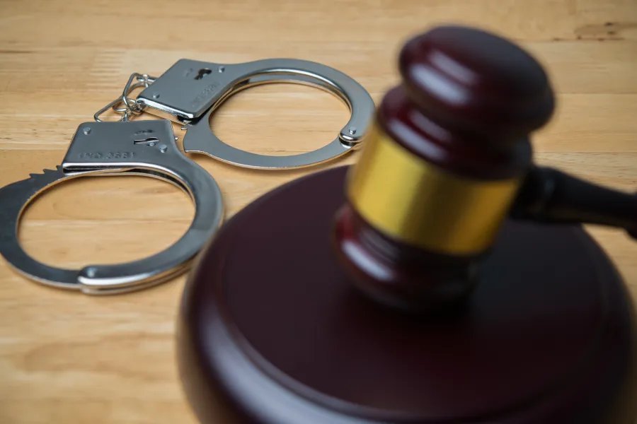 Man charged with terrorism over hotel burn threat