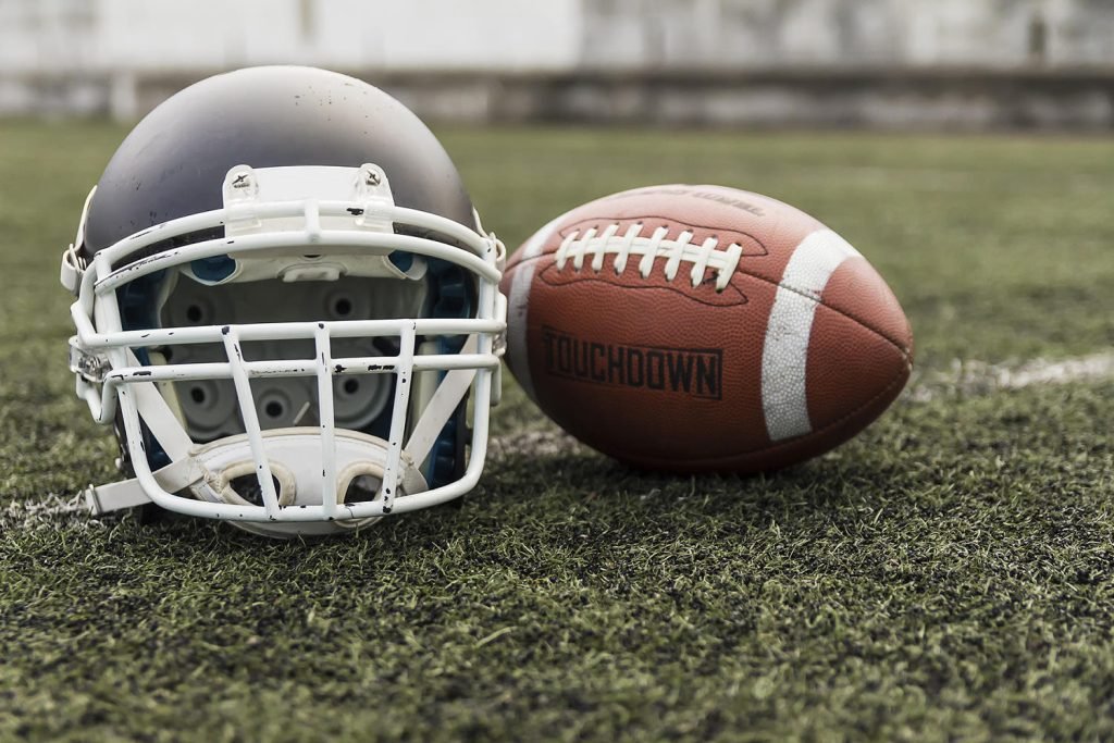 Dad cited for tripping 9-year-old during football game