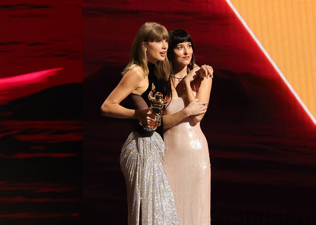 Taylor Swift Surprises Dakota Johnson with Birthday Cake on SNL