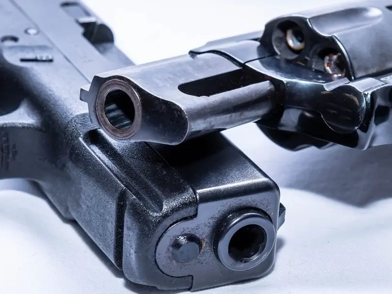 Driver arrested with 2 guns, hollow-point ammo