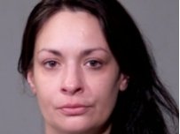 Woman Held Without Bail After Knife Threat
