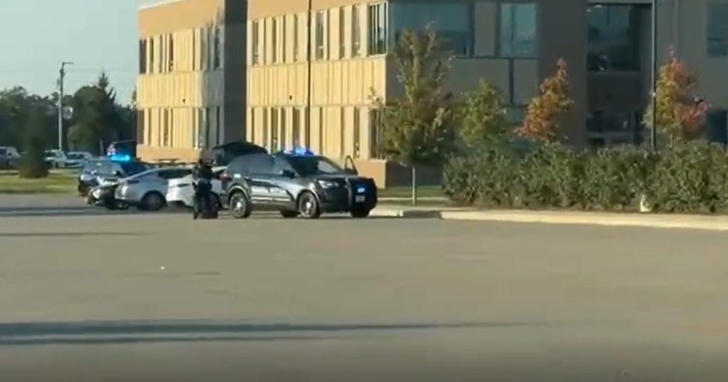 Shots fired in high school locker room, suspect still loose