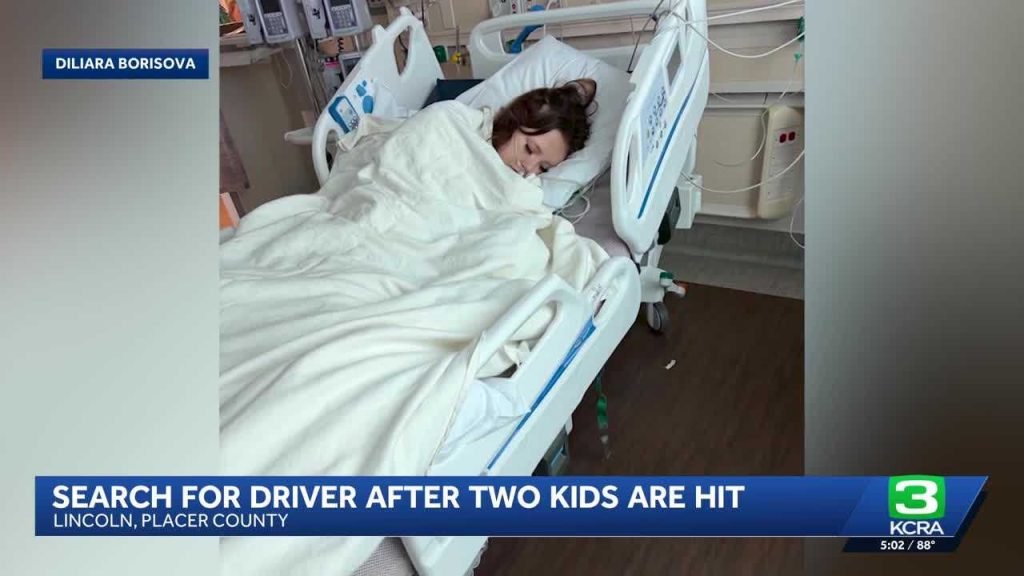 Gray truck hits two kids on scooter, driver flees