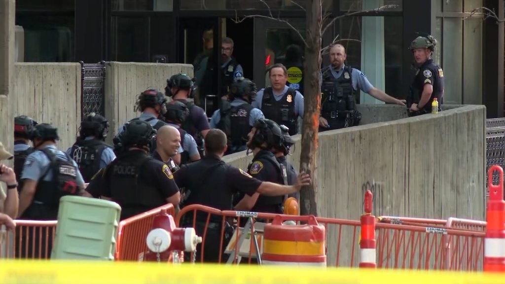 Mass shooting at Minneapolis high-rise kills 2, injures officers
