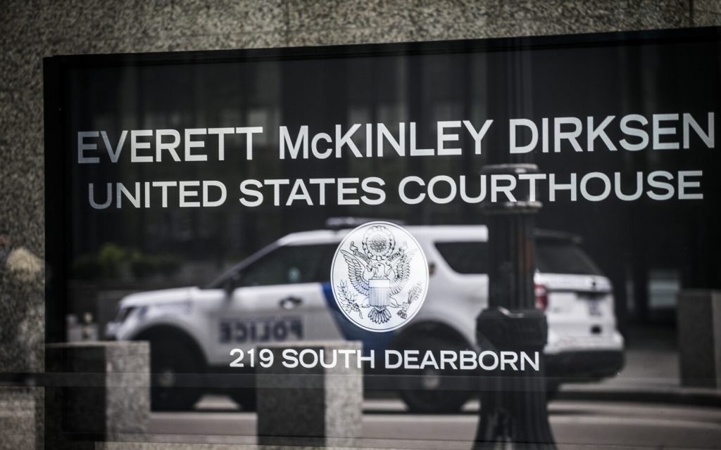Man gets 19 years for shooting guard during bank robberies