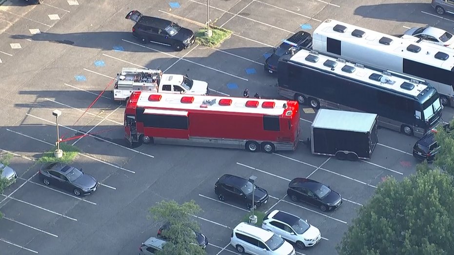 Worker crushed under tour bus at Virginia concert venue