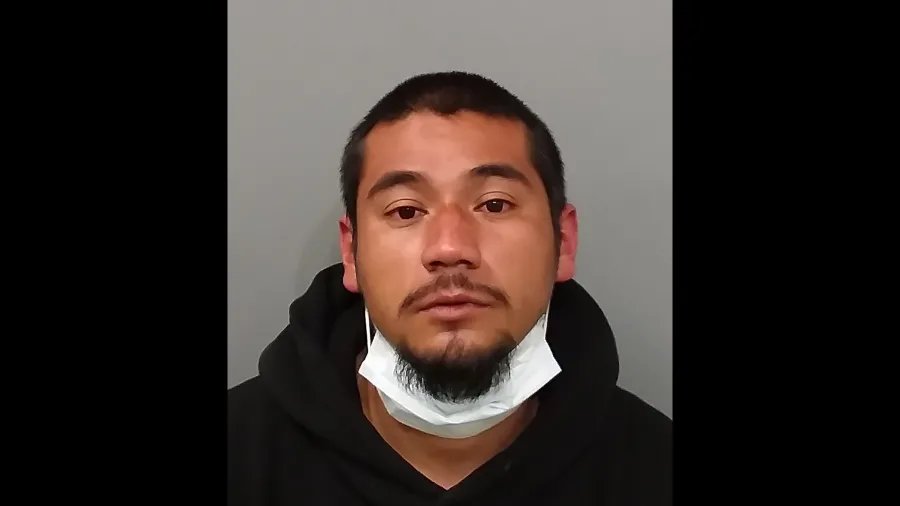 Man accused of burning down house with family inside pleads not guilty