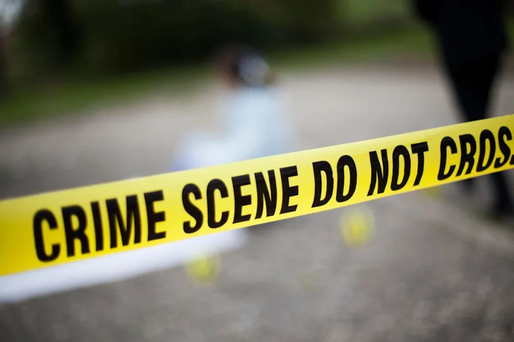 2 men shot dead in yard—killer still unknown