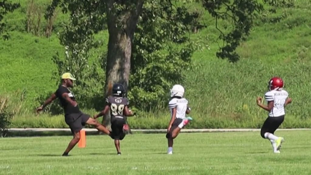 Dad arrested after tripping child at football game