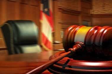 Woman arrested at courthouse during Clancy trial
