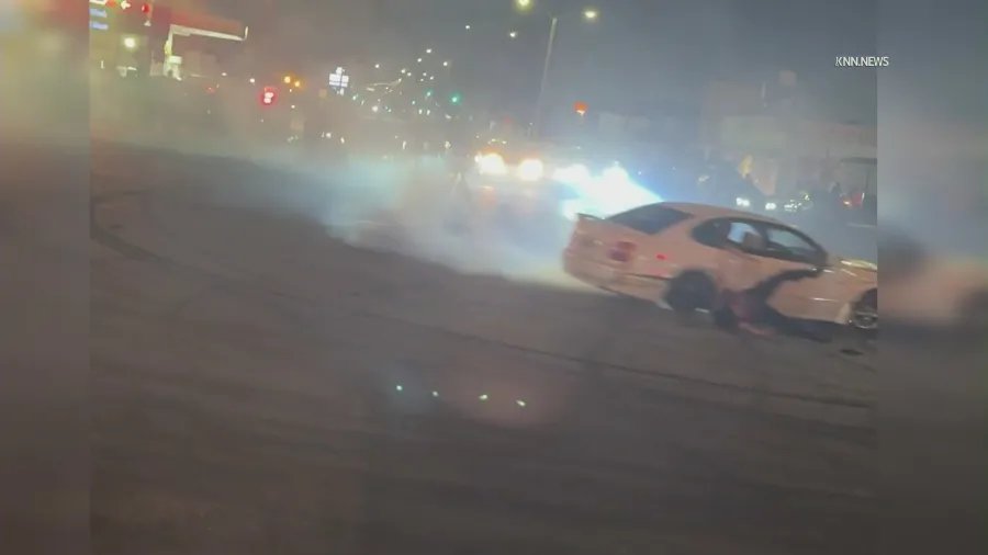 Person falls from car during South LA street takeover