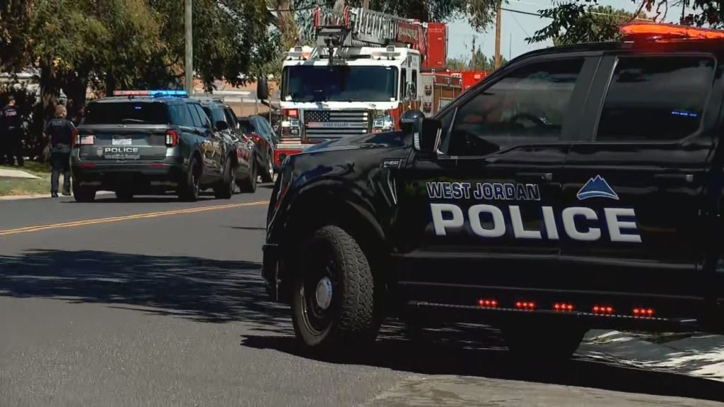 Teen and Father Charged in Kearns Funeral Shooting