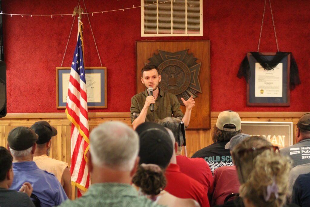 Progressive Journalist Ahlman Suspends Nebraska Race