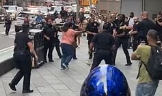 Woman shot by police in Times Square knife attack